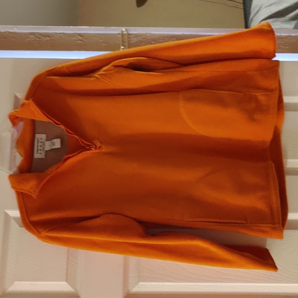 Barely worn- Lady Foot Locker sport Orange fleece with half zipper, size M.